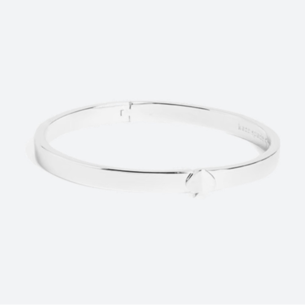 Kate Spade Heritage Spade Enamel flex cuff. NWT, silver.